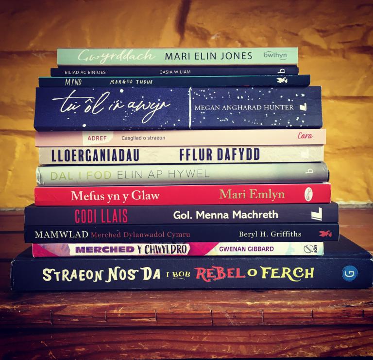 Stack of Welsh-language and English-language books. 