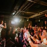 Tom from Buzzard Buzzard Buzzard sings to a packed crowd in Clwb Ifor Bach during 6 Music Festival